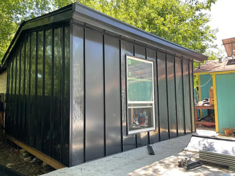 Black standing seam metal wall panels for Roof Inspection in Ishpeming