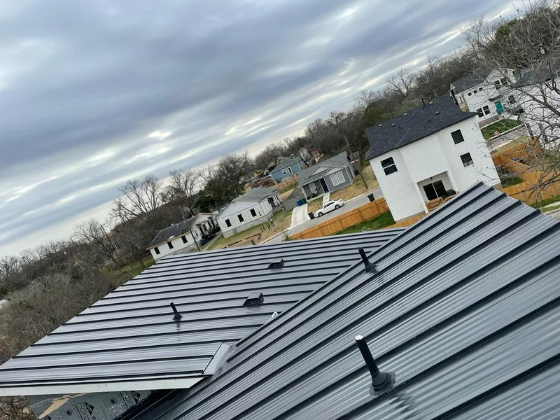Standing seam metal roof panels with vents for Skylight Repair in Ishpeming